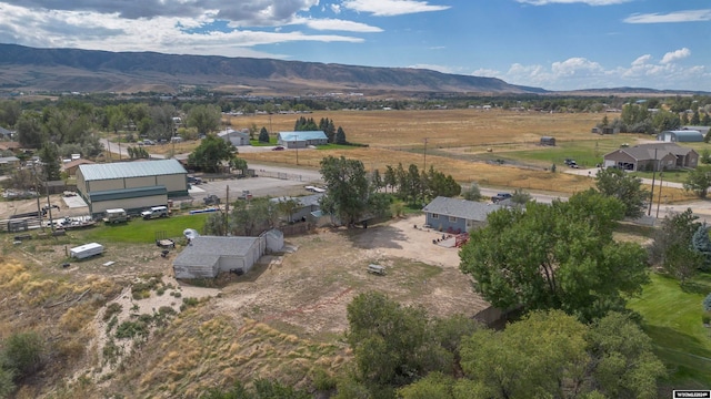 drone / aerial view with a mountain view and a rural view