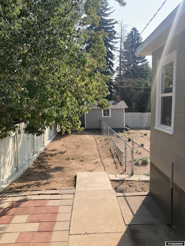 view of patio with an outdoor structure