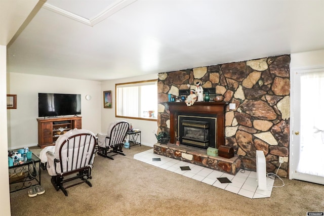 living room featuring a fireplace and light colored carpet