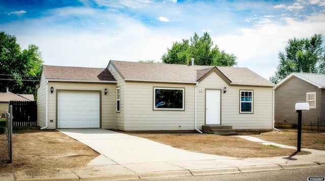 single story home with a garage