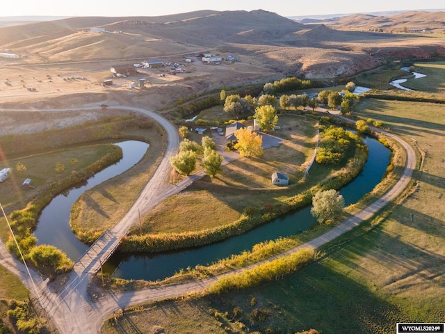 bird's eye view featuring a water and mountain view