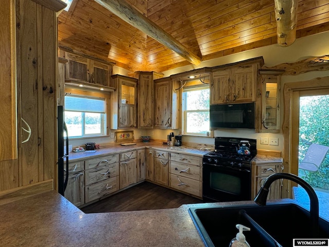 kitchen with dark hardwood / wood-style flooring, wooden ceiling, black appliances, beam ceiling, and sink