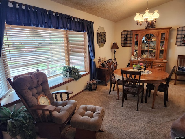 dining area featuring carpet, lofted ceiling, a textured ceiling, and a notable chandelier