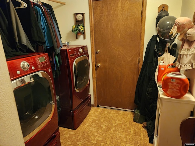 laundry area featuring washing machine and dryer