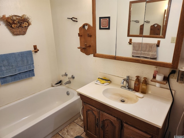 bathroom featuring shower / bathing tub combination and vanity