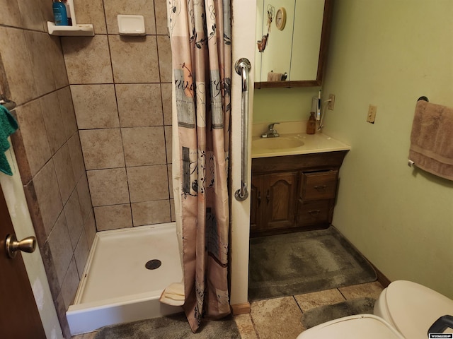 bathroom with toilet, tile patterned flooring, vanity, and a shower with shower curtain