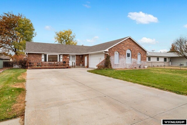 2226 E I St, Torrington, WY 82240 - deck with outdoor dining area and a grill
