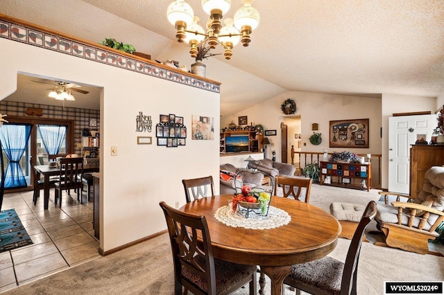 2226 E I St, Torrington, WY 82240 - dining space with vaulted ceiling, a chandelier, baseboards, ceiling fan, and a textured ceiling