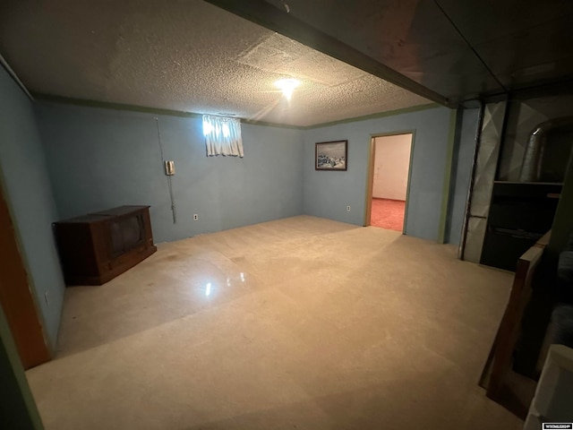 basement featuring a textured ceiling