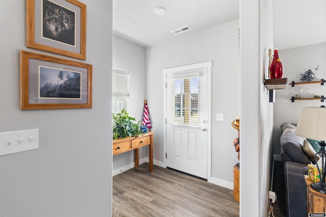 foyer with light wood-type flooring