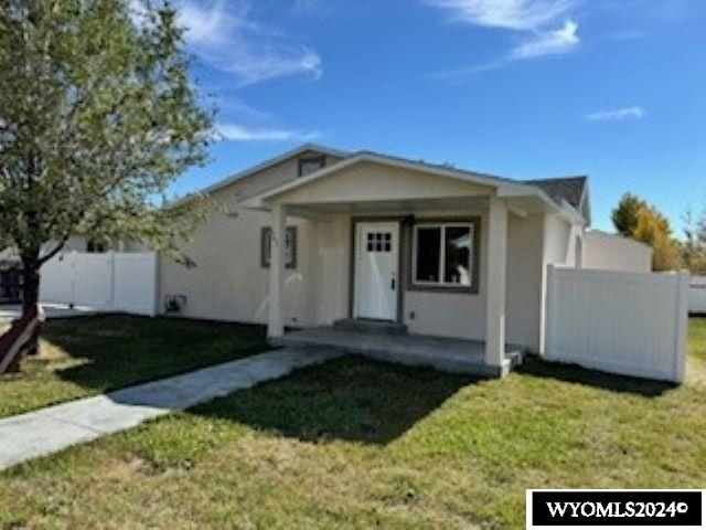 207 W Walnut Sts, Lyman, WY 82937 - view of front of home with stucco siding