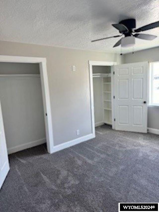 207 W Walnut Sts, Lyman, WY 82937 - unfurnished bedroom featuring carpet, baseboards, a textured ceiling, and a ceiling fan