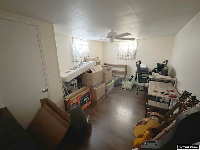 interior space with dark hardwood / wood-style floors and ceiling fan