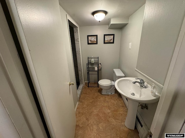 bathroom featuring toilet