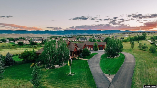 aerial view at dusk with a mountain view