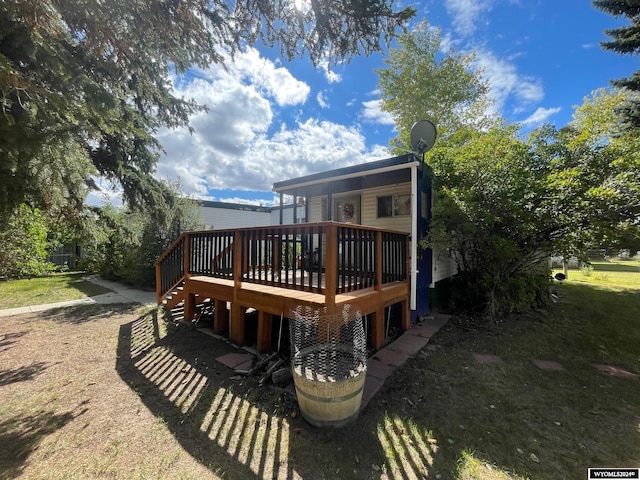 deck featuring a lawn