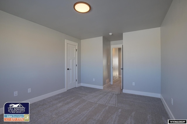 empty room featuring carpet flooring