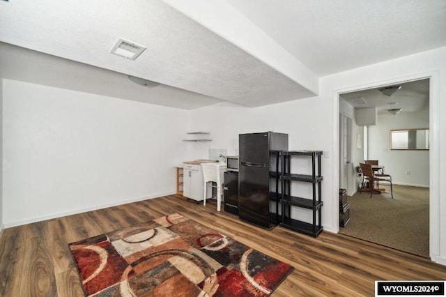 living room with dark wood-type flooring