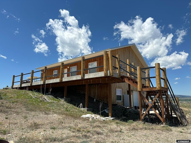 rear view of house with a deck