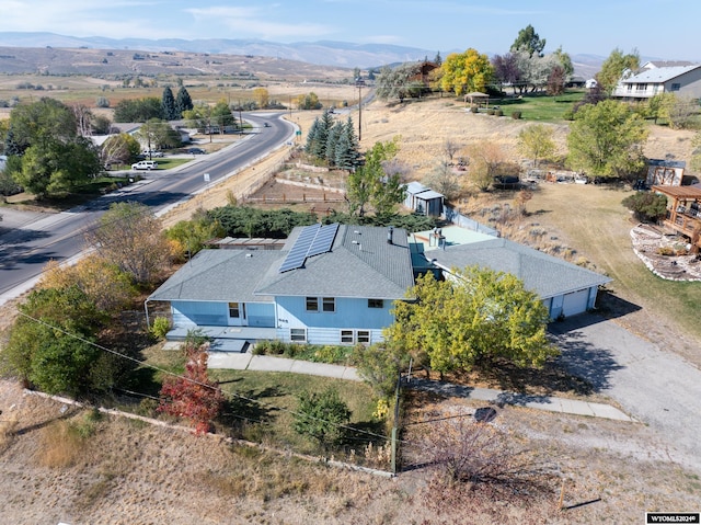 drone / aerial view featuring a mountain view