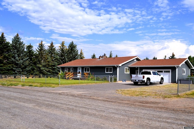 ranch-style house featuring a garage