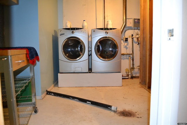 washroom featuring independent washer and dryer