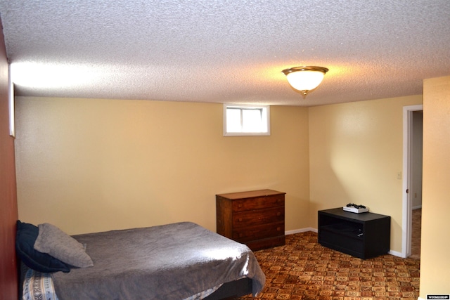 bedroom with a textured ceiling