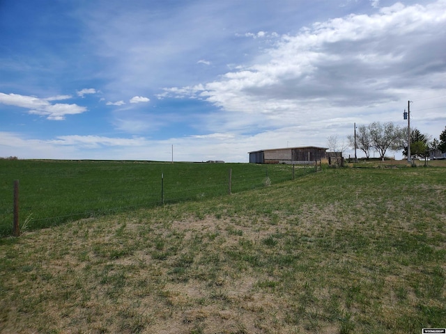 view of yard featuring a rural view