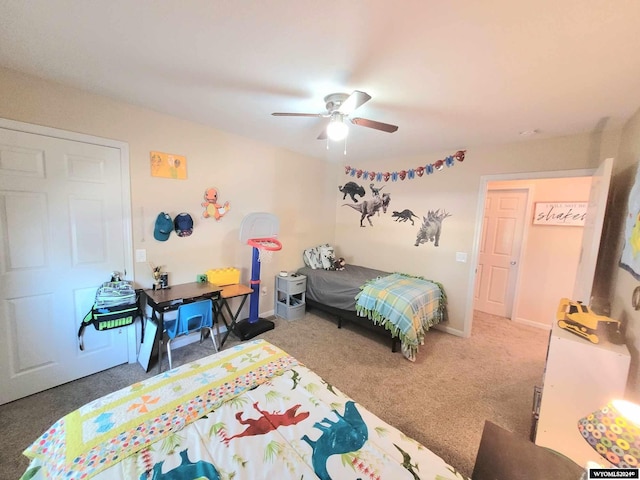 carpeted bedroom featuring ceiling fan