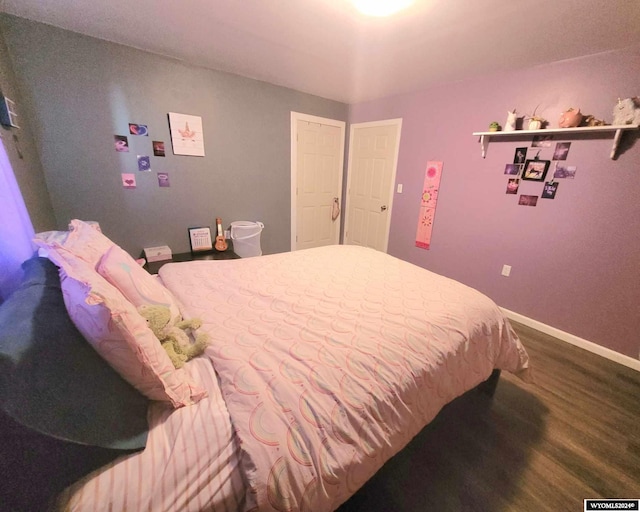 bedroom featuring hardwood / wood-style floors