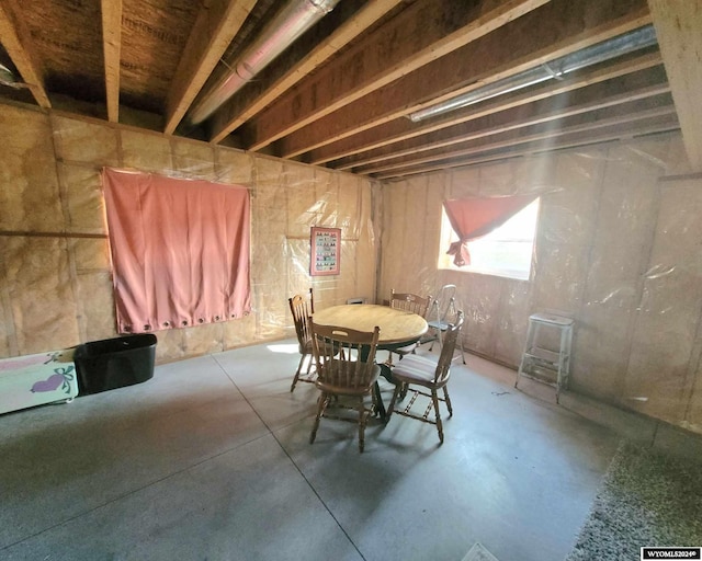 unfurnished dining area with concrete floors