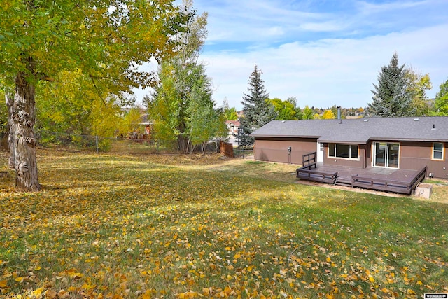 view of yard featuring a deck