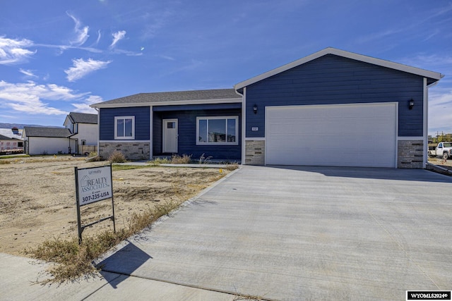 view of front of home with a garage