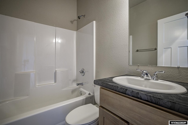 full bathroom featuring shower / tub combination, vanity, and toilet