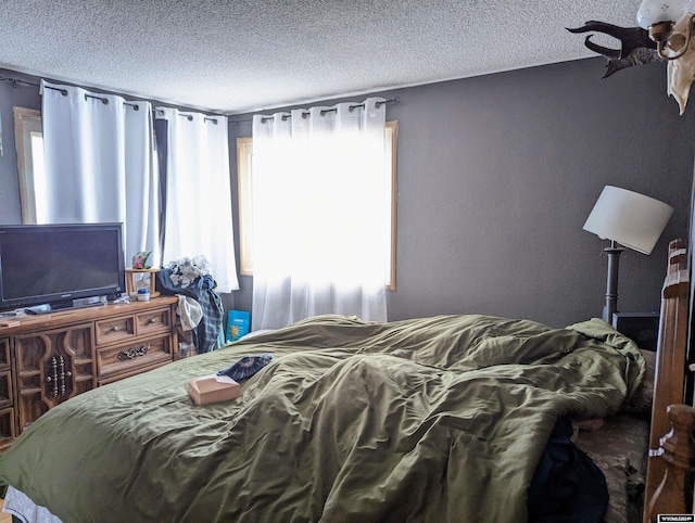 bedroom with a textured ceiling