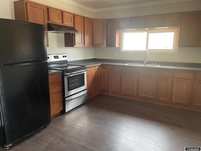 kitchen featuring sink, black refrigerator, dark hardwood / wood-style floors, and stainless steel electric range