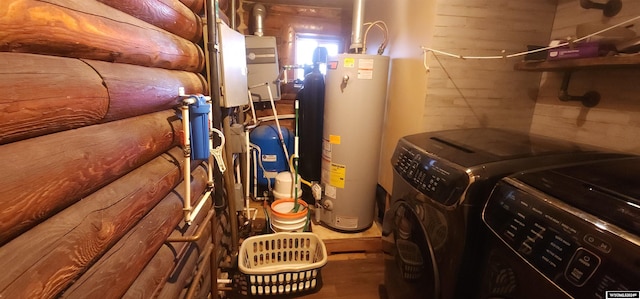 utilities with washing machine and dryer and gas water heater