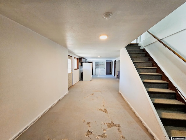 interior space with a textured ceiling