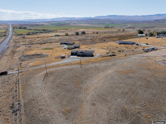 aerial view featuring a rural view and a mountain view