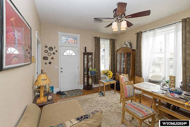 entryway featuring ceiling fan and hardwood / wood-style floors