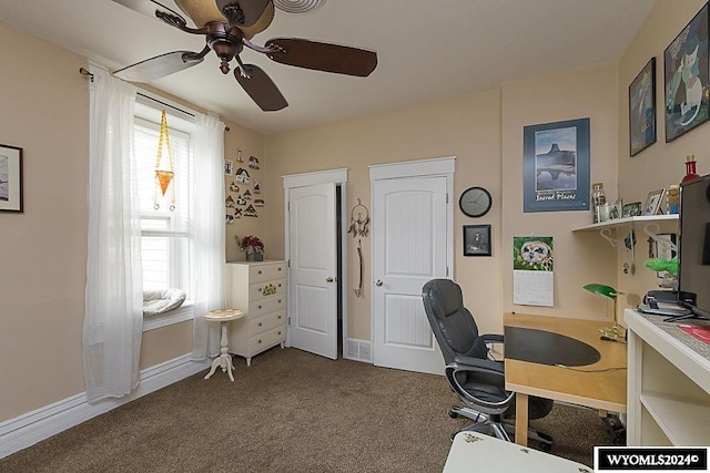 office space featuring carpet and ceiling fan