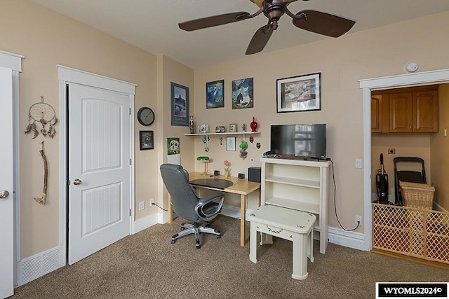 office area featuring ceiling fan and carpet flooring