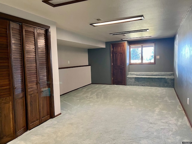 interior space with a textured ceiling