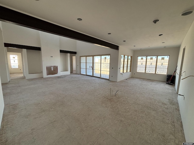 6060 Rivers Gate, Casper, WY 82604 - unfurnished living room featuring plenty of natural light and light colored carpet