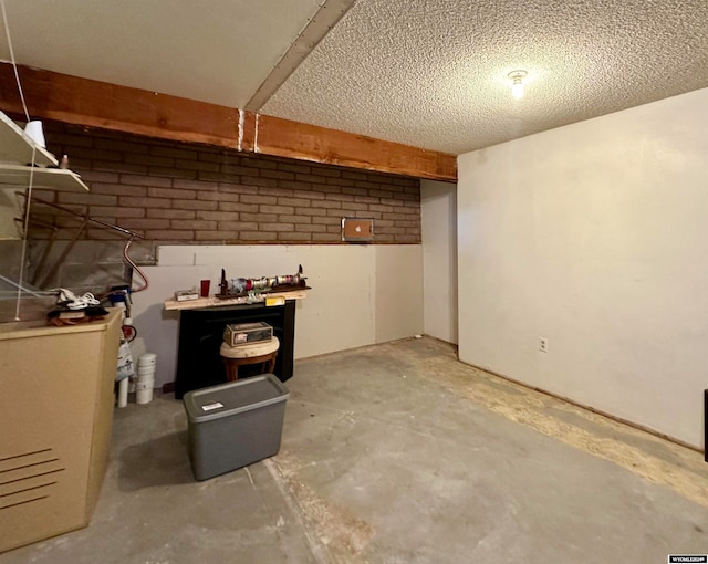 36 County Road 211, Riverside, WY 82325 - basement with a textured ceiling and a workshop area