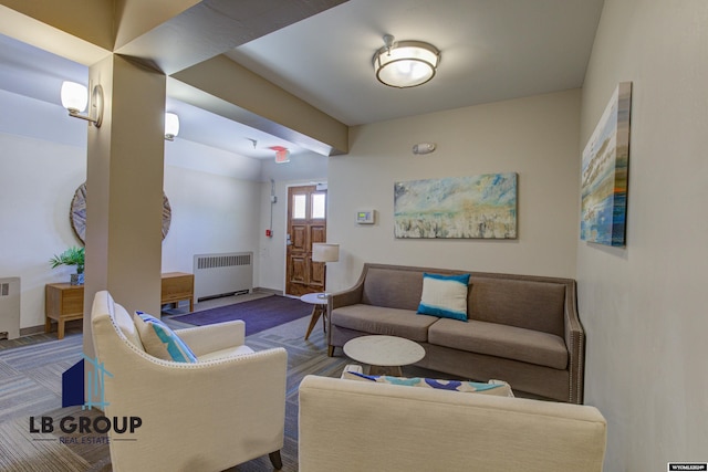 living room featuring carpet flooring and radiator heating unit