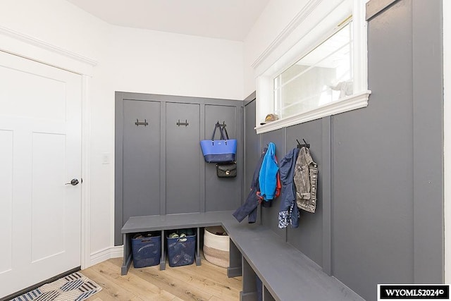 mudroom with light hardwood / wood-style floors