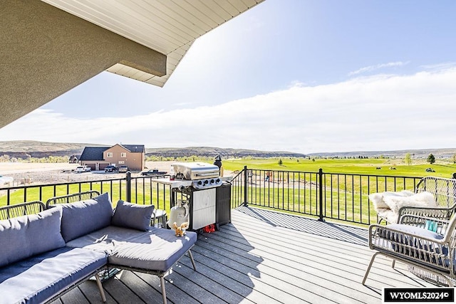 21 Branding Iron Dr, Green River, WY 82935 - deck featuring an outdoor hangout area and grilling area