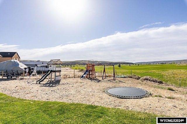 view of playground featuring a rural view