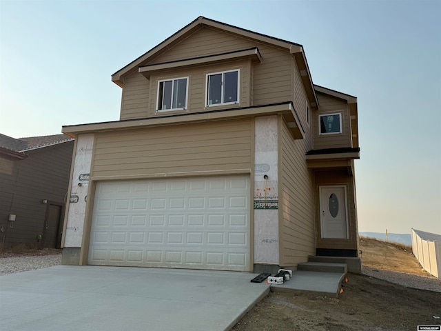 view of property with a garage